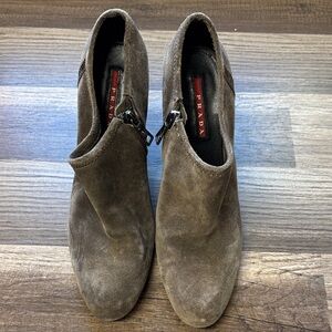 Prada women's gray suede ankle booties with a side zip closure and block heel